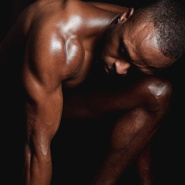 Person feeling energized and stretching arms upwards.